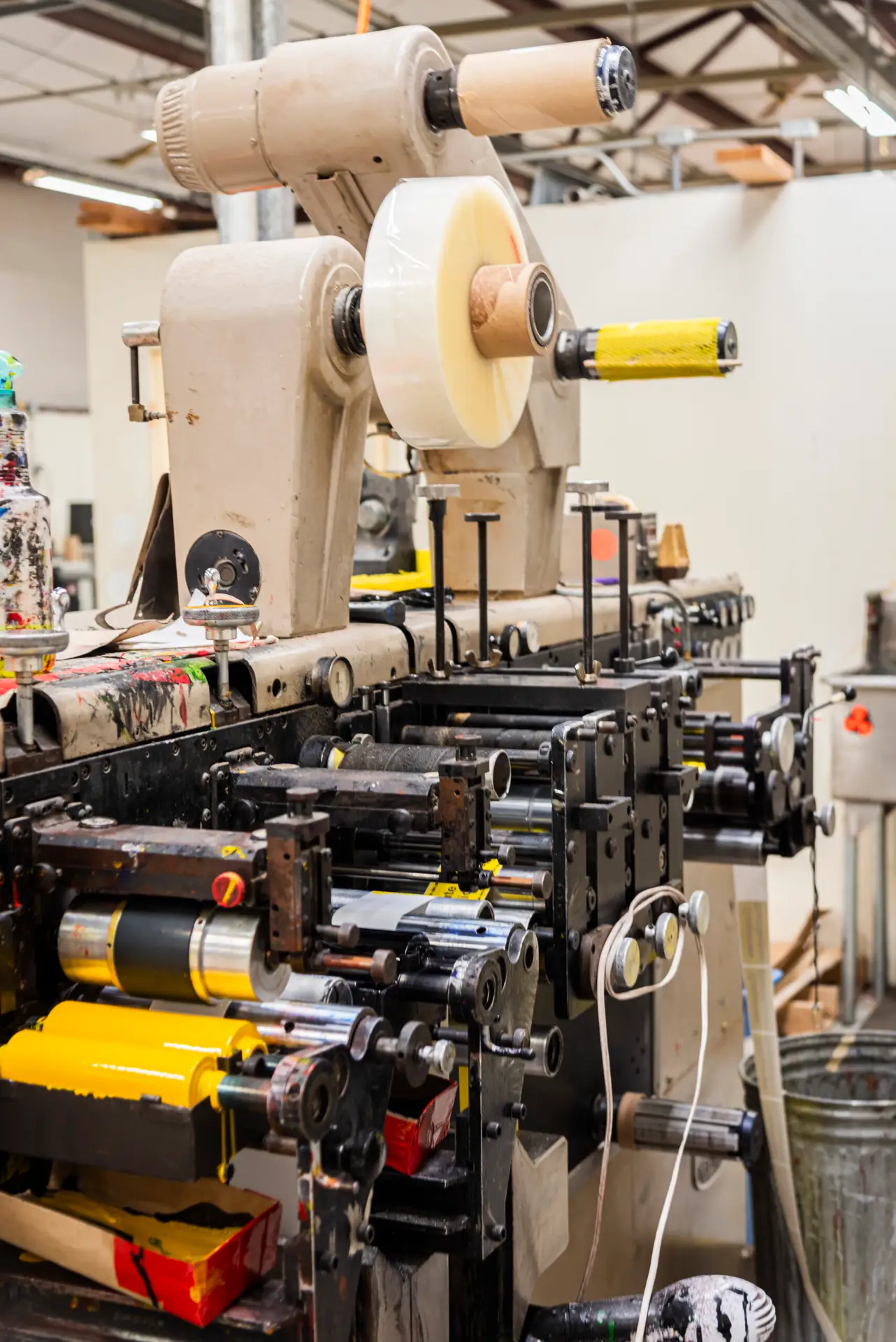Flexographic printing press running yellow labels