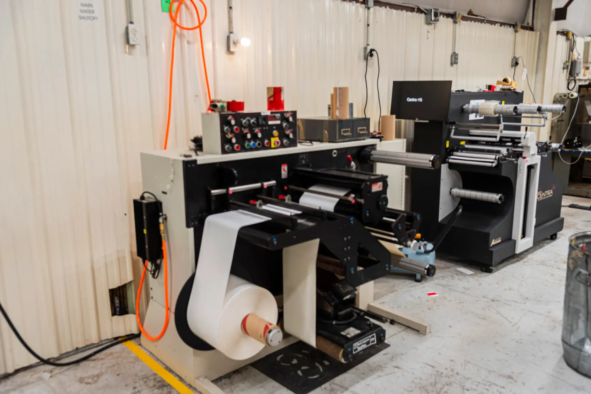 Printing press with large roll of paper